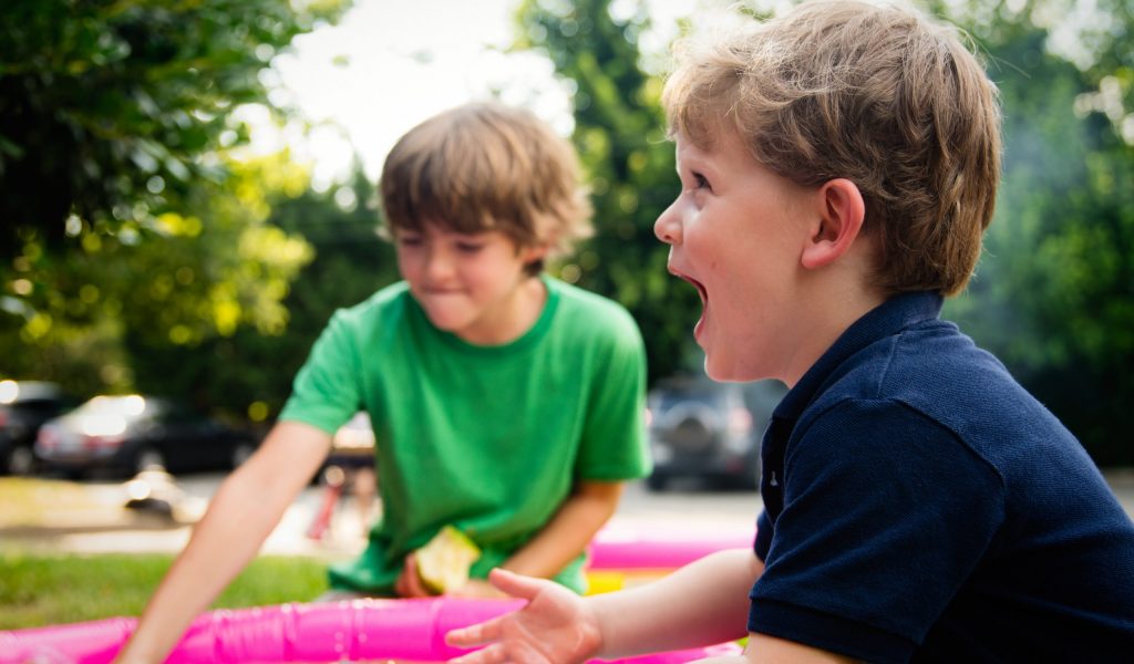 boys playing in the backyard