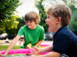 boys playing in the backyard