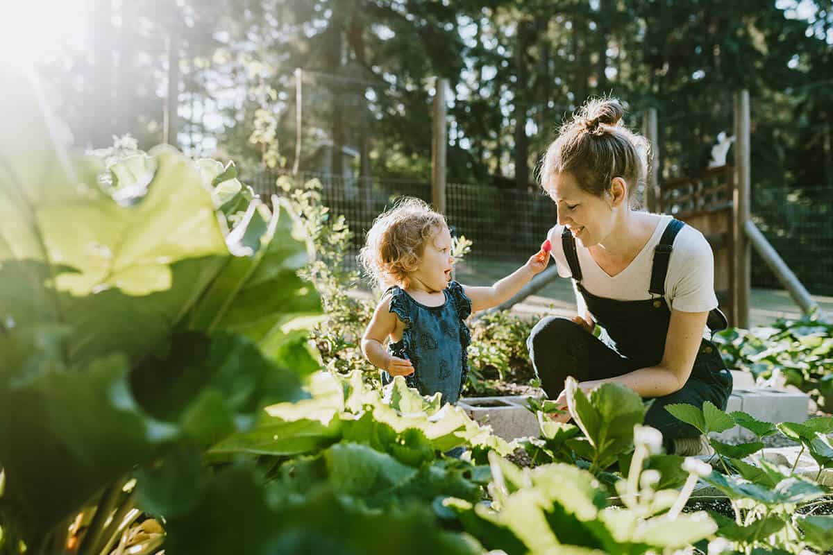 A yard bonding with a mother and daughter